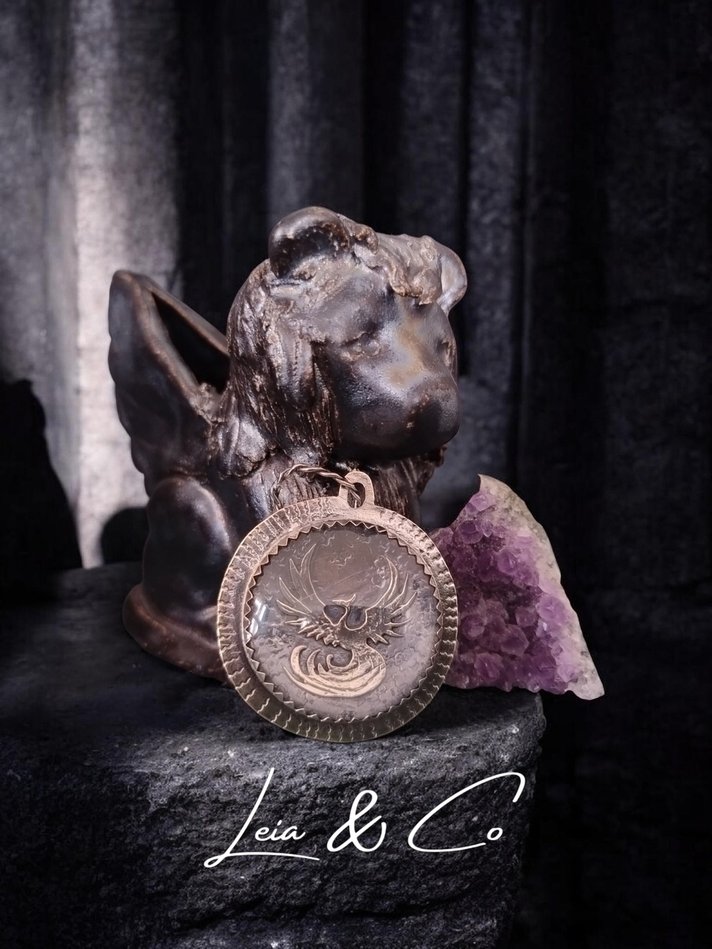 Griffon et pendentif phénix